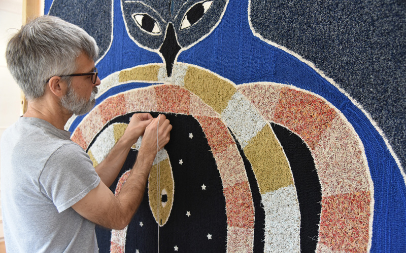 Artist Troy Dugas at work in the studio.