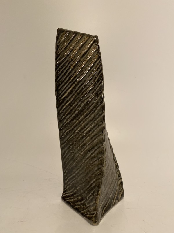 Twisted dark green ceramic ikebana vase